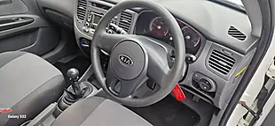 Used 2010 Kia Rio Domino White - Interior and Exterior details 8