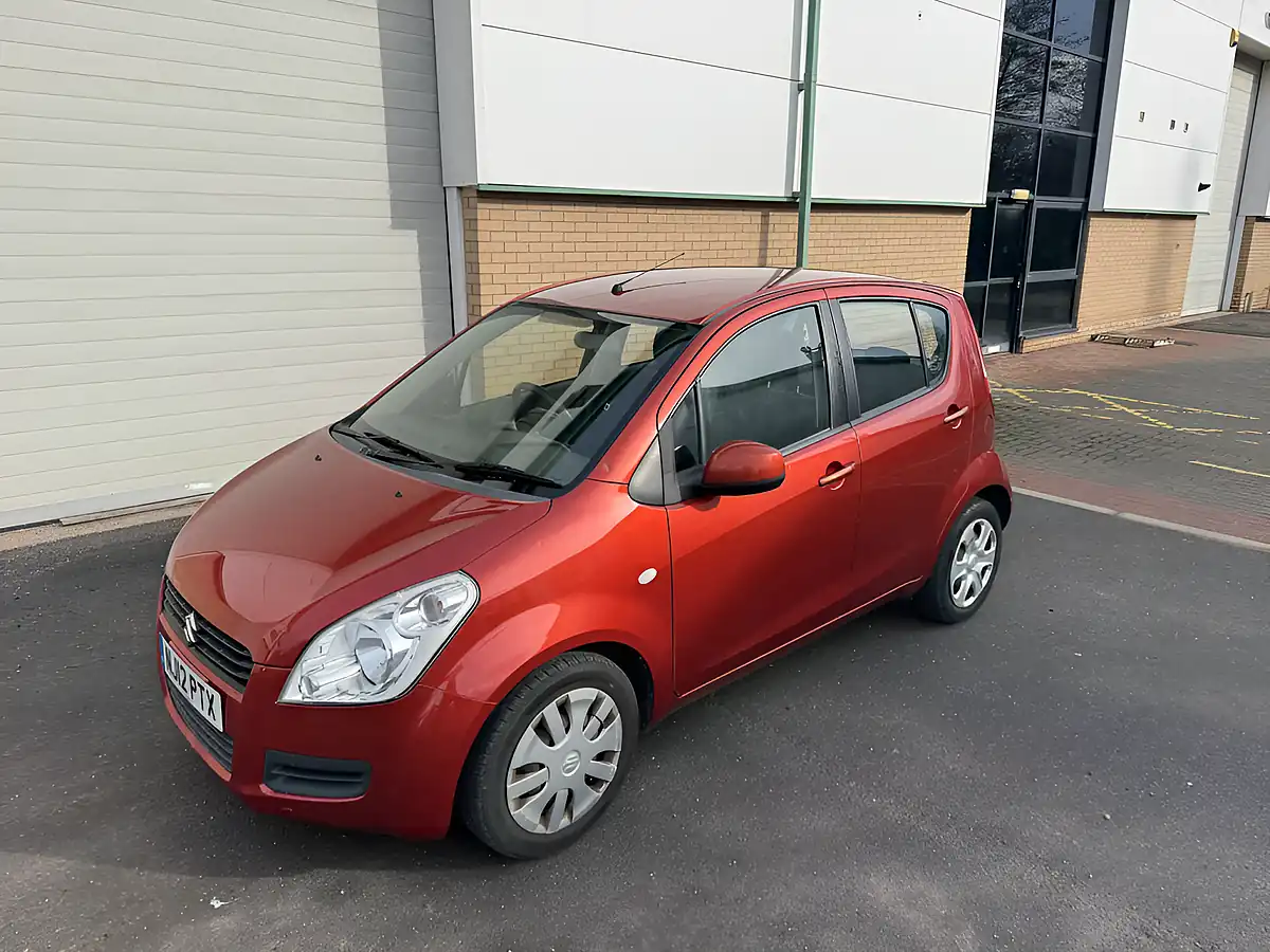 Used 2012 Suzuki Splash SZ3 Orange - Front View