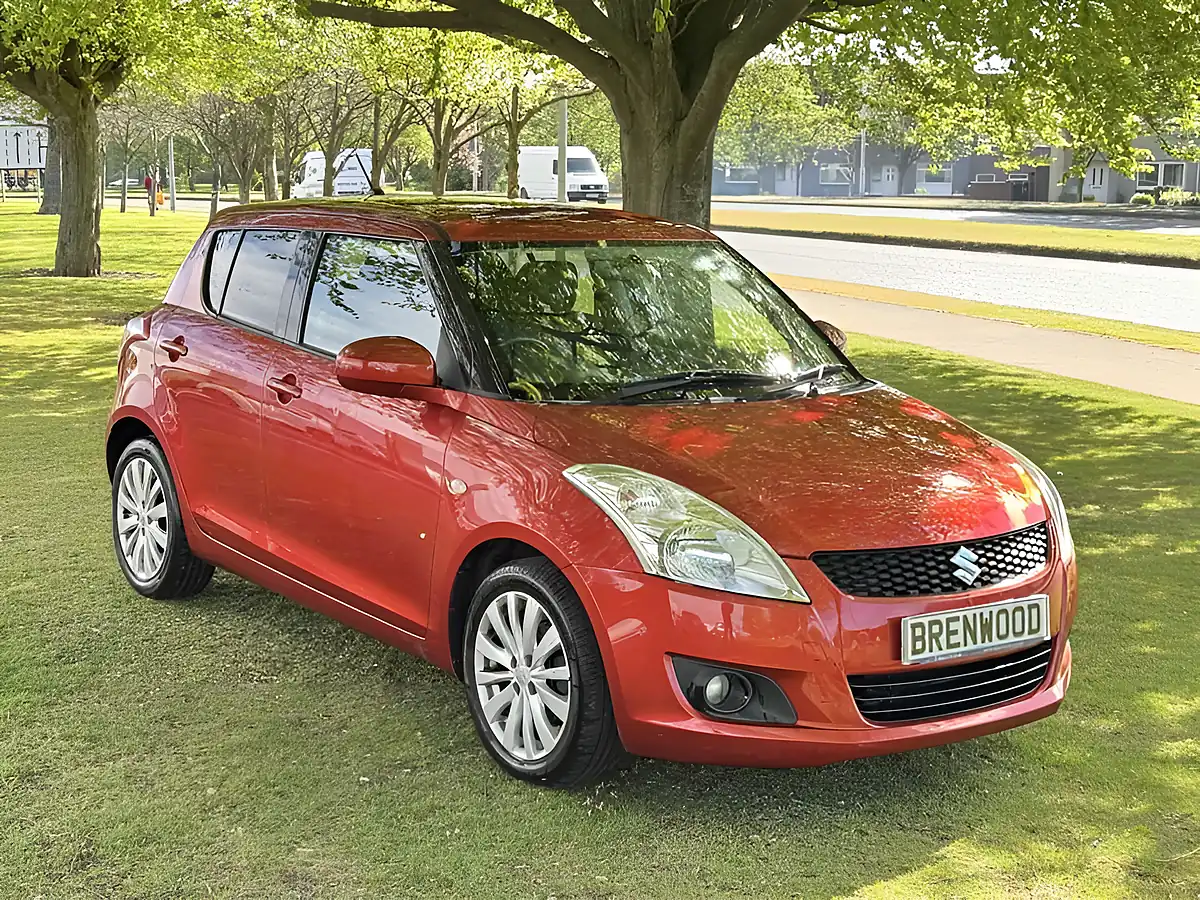 Used 2012 Suzuki Swift SZ4 Orange - Front View