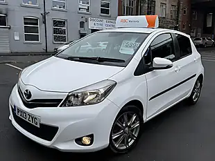 Used 2013 Toyota Yaris Sr White - Interior and Exterior details 9