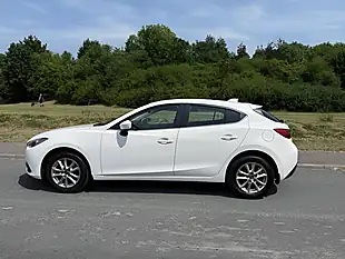 Used 2014 Mazda Mazda3 Se White - Interior and Exterior details 5