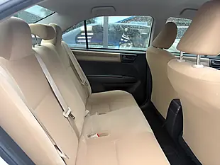 Used 2015 Toyota Corolla Axio Hybrid Pearl White - Interior and Exterior details 14