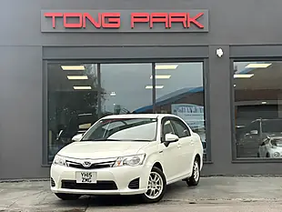 Used 2015 Toyota Corolla Axio Hybrid Pearl White - Interior and Exterior details 8