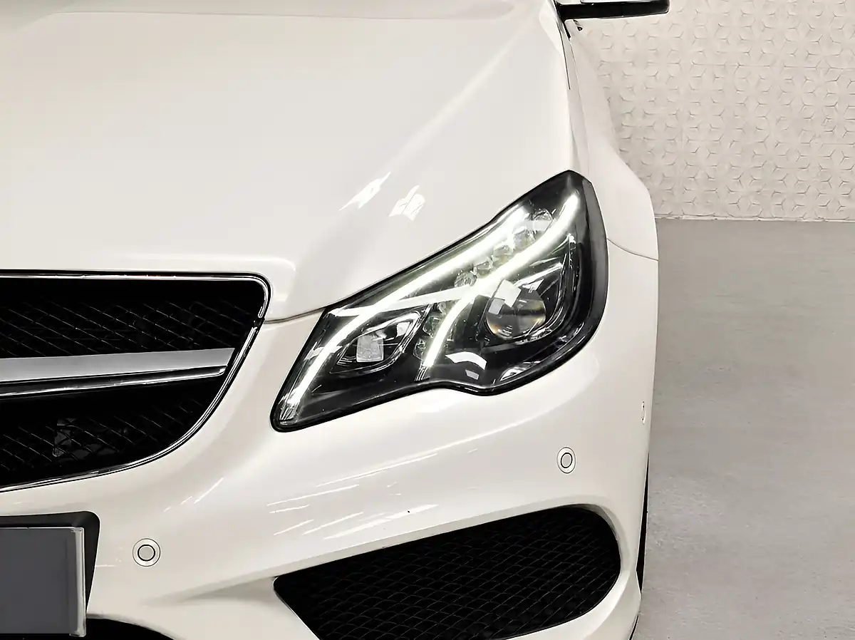 Used 2016 Mercedes-Benz E-Class AMG Line Premium Plus Designo Diamond White - Interior and Exterior details 9