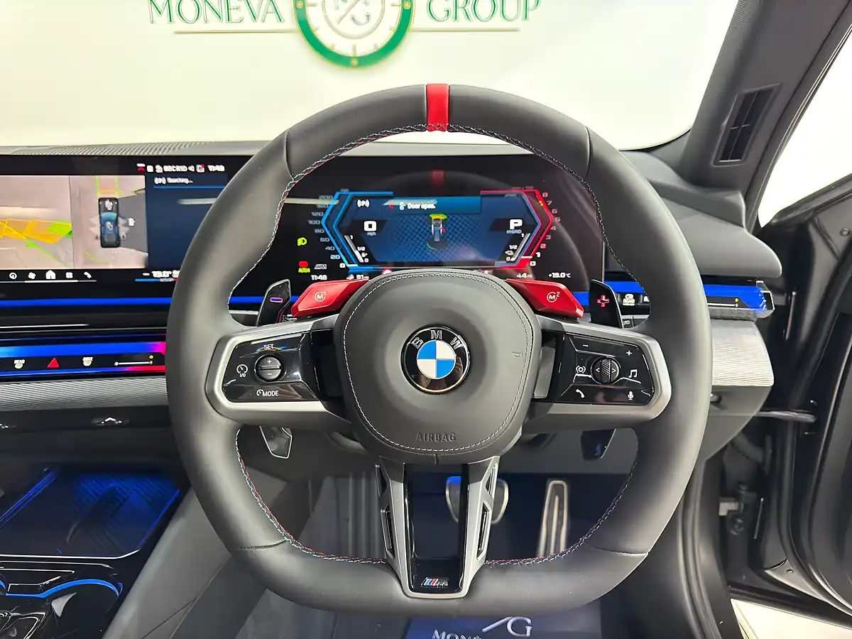 Used 2025 BMW M5 Touring Frozen Deep Grey - Interior and Exterior details 9
