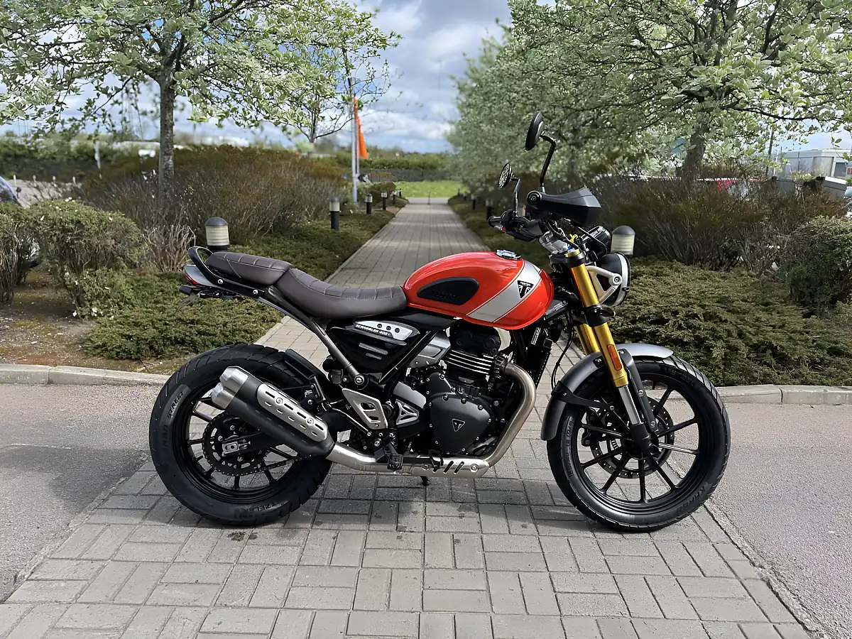 Used 2025 Triumph Scrambler 400 X Orange/Silver - Front View